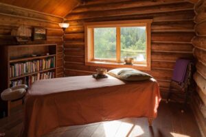 Masseuse table in Cabin at Feathered Pipe Ranch in Montana.