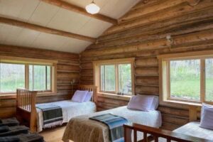 Rooms in cabin at Feathered Pipe Ranch in Montana.