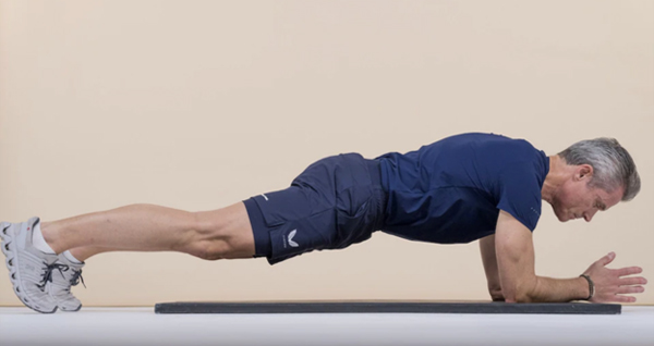 An elderly man demonstrating a plank exercise – Photo Credit: Andrew Crowley for The Telegraph